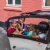 Triobike Boxter Mid Drive mit vier Kindern Klein
